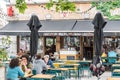 Brussels Old Town - Belgium - Flemish people drinking at the terrace of the De Walvis brasserie near the Dansaert street