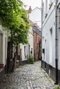 Brussels Old Town - Belgium - The narrow medieval Rue de la Cigogne - Ooievaarstraat - Stork street with cobble stones and tiny