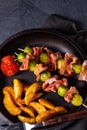 A Brussels sprouts - Bacon - skewers with potato widgets Royalty Free Stock Photo