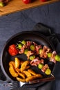 A Brussels sprouts - Bacon - skewers with potato widgets Royalty Free Stock Photo