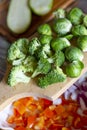 Brussels sprouts, broccoli, chopped red sweet pepper, onion and zucchini. Royalty Free Stock Photo