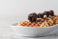 Brussels waffles with blackberries on plate Royalty Free Stock Photo