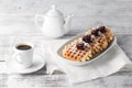 Brussels waffles with blackberries on white plate Royalty Free Stock Photo