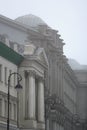 Brutal architecture with columns, stucco and rhythm of windows. Royalty Free Stock Photo