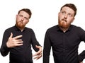 Brutal, attractive, bearded man poses in a black shirt, isolated on a white background Royalty Free Stock Photo