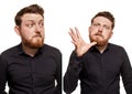 Brutal, attractive, bearded man poses in a black shirt, isolated on a white background Royalty Free Stock Photo