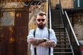 Portrait of bearded man with tattooes on his arms Royalty Free Stock Photo