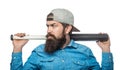 Brutal bearded man using baseball bat for fighting. Man swung the bat. Bandit gang and conflict. Sport. Street hooligan