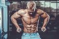 Brutal caucasian handsome fitness men on diet training chest pumping