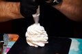 Brutal male hands prepare meringue