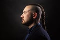 Man with dreadlocks, looks like a viking, Iroquois haircut Royalty Free Stock Photo