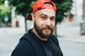 Brutal and muscular beard biker on the motorcycle