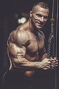 Brutal strong athletic men pumping up muscles workout bodybuilding concept Royalty Free Stock Photo