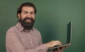 brutal unshaven guy university lecturer at chalkboard, new technology