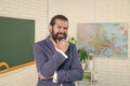 brutal unshaven guy university lecturer in classroom, education Royalty Free Stock Photo