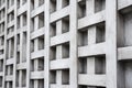A brutalism-inspired design with minimalistic lines, a monochromatic gray palette, and textured