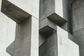 A brutalism-inspired design with minimalistic lines, a monochromatic gray palette, and textured