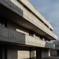 Brutalist architecture characterized by bare concrete slabs and angular lines. The Royalty Free Stock Photo