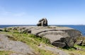 Brutt Lenke or Broken Chain monument on top of a large rock on North Sea coast in Kvernevik suburb