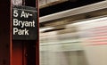 Bryant Park NYC Subway Station Sign Blurred Motion Train Commuting to Work Royalty Free Stock Photo