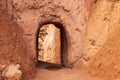 Bryce Canyon - Queens Garden hiking trail going through a tunnel made of massive steep hoodoo sandstone rock formations in Utah Royalty Free Stock Photo