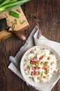 Bryndzove Halusky, national dish in Slovakia, potato dumplings with sheep cheese and sour cream, topped with roasted bacon pieces Royalty Free Stock Photo