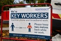 BT Openreach sign saying we`re key workers, essential phone and broadband work, please keep two metres back while we work