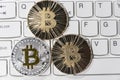 BTC Bitcoin coins on keyboard Royalty Free Stock Photo