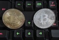 BTC Bitcoin coins on keyboard Royalty Free Stock Photo