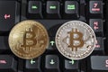 BTC Bitcoin coins on keyboard Royalty Free Stock Photo