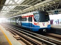 BTS Skytrain on elevated rails stop at Pho-nimit station. The Bangkok Mass Transit System.