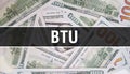 BTU text Concept Closeup. American Dollars Cash Money,3D rendering. BTU at Dollar Banknote. Financial USA money banknote Royalty Free Stock Photo