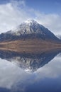 Buachaille Etive Mor aerial during autumn reflection on still river Royalty Free Stock Photo