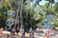 Bubble blower for children and adults in a parc Royalty Free Stock Photo