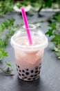 Bubble boba tea with milk and tapioca pearls in plastic cup Royalty Free Stock Photo