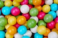 Bubble gum chewing gum texture. Rainbow multicolored gumballs chewing gums as background. Round sugar coated candy