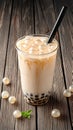 Bubble milk tea displayed on wooden background, enticing beverage concept Royalty Free Stock Photo