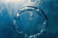 Bubble ring Underwater ascends towards the sun Royalty Free Stock Photo