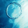 Bubble Ring Underwater ascends towards the Sun Royalty Free Stock Photo