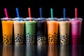 Bubble tea in various flavors, variety of tapioca tea milkshake in a row.