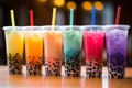 Bubble tea in various tastes, variety of tapioca tea milkshake in a row.