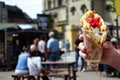 Bubble waffles with ice cream in hand. Hong kong waffle . Bubble waffles with strawberries, whipped cream and marshmallow are sold