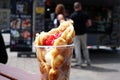 Bubble waffles with ice cream. Hong kong waffle . Bubble waffles with strawberries, whipped cream and marshmallow are sold on Open