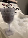 Bubble whirlpool bath time with wine