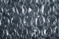 Bubble wrap film close-up, translucent polyethylene shockproof material macro photo background Royalty Free Stock Photo