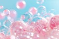 Bubbles float in soft tones of pink and blue. The scene shows a blend of colors creating a gentle effect. Light reflects off the Royalty Free Stock Photo