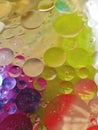 Bubbles floating in water in happy colors