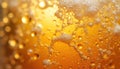 Bubbles and foam of a golden yellow liquid fill the frame. The effervescence creates a dynamic texture with many small spheres. Royalty Free Stock Photo