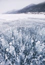 Bubbles in ice of Baikal lake. Winter landscape Royalty Free Stock Photo