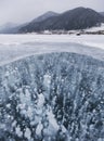 Bubbles in ice. Baikal lake. Winter landscape Royalty Free Stock Photo